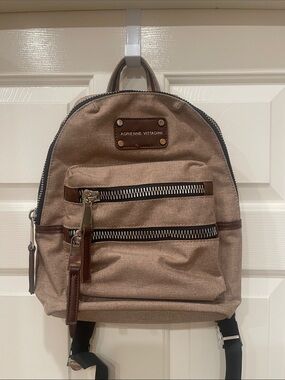 Adrienne Vittadini Tan Canvas Backpack with Brown Trim 12”W 12”H